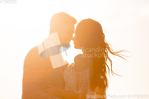 Image of Caucasian romantic young couple celebrating their marriage in city