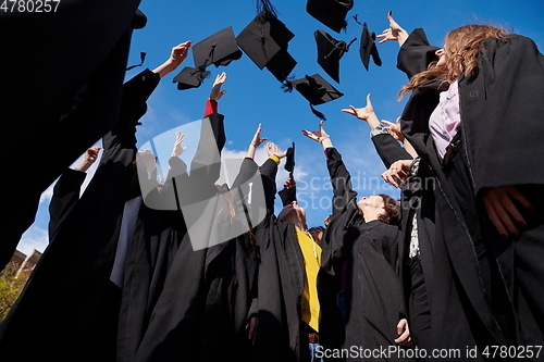 Image of Group of diverse international graduating students celebrating