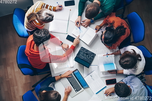 Image of students use modern technology for a school project