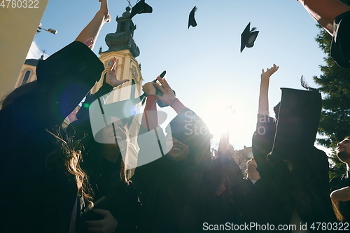 Image of Group of diverse international graduating students celebrating