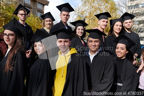 Image of Group of diverse international graduating students celebrating