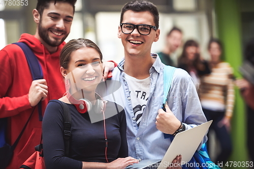 Image of students using modern technology for school project