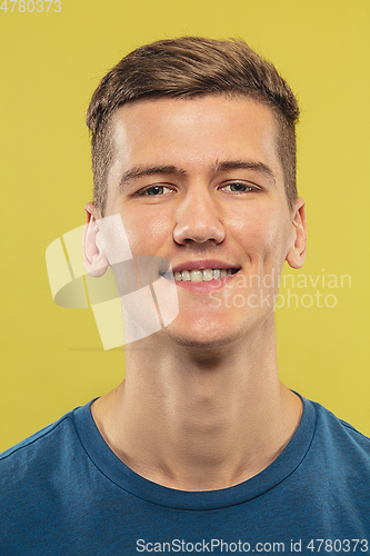 Image of Caucasian young man\'s close up shot on yellow background