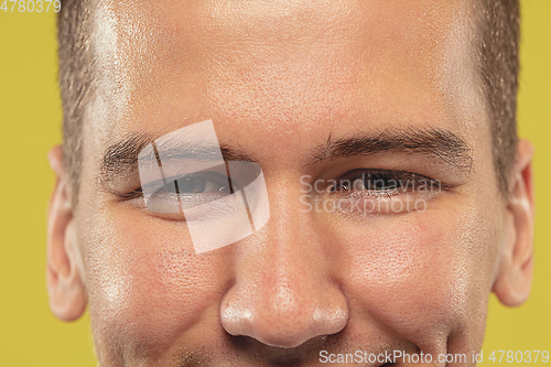 Image of Caucasian young man\'s close up shot on yellow background