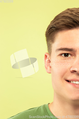 Image of Caucasian young man\'s close up shot on green background