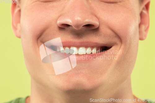 Image of Caucasian young man\'s close up shot on green background