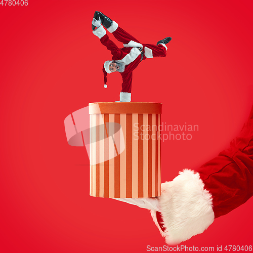 Image of Happy Christmas Santa Claus on studio background