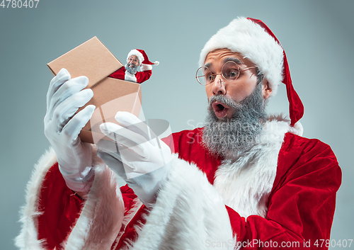 Image of Happy Christmas Santa Claus on studio background