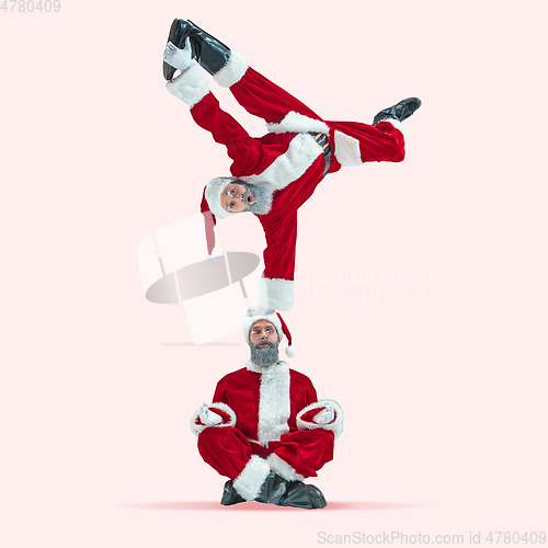 Image of Happy Christmas Santa Claus on studio background