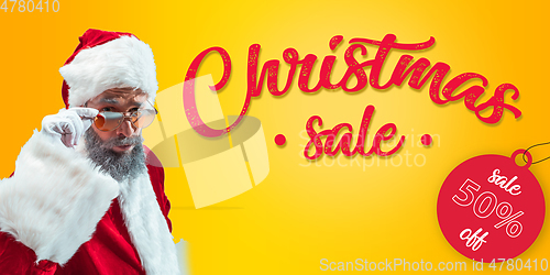 Image of Happy Christmas Santa Claus on studio background