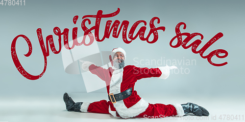 Image of Happy Christmas Santa Claus on studio background