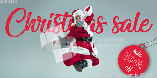 Image of Happy Christmas Santa Claus on studio background