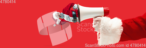 Image of Happy Christmas Santa Claus on studio background