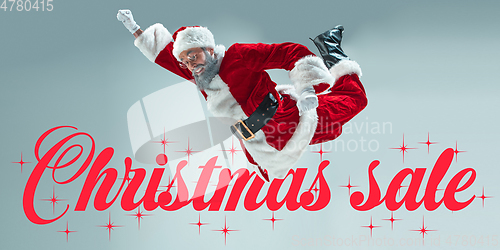 Image of Happy Christmas Santa Claus on studio background