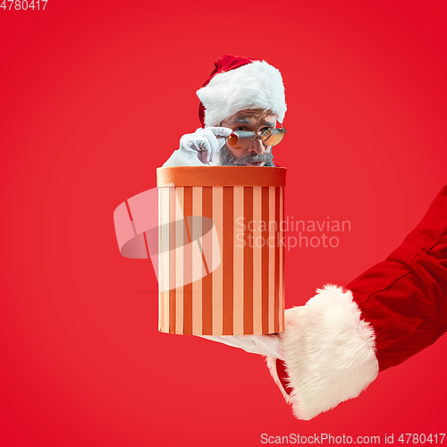 Image of Happy Christmas Santa Claus on studio background