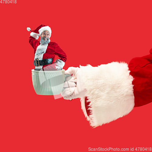 Image of Happy Christmas Santa Claus on studio background