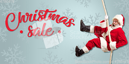 Image of Happy Christmas Santa Claus on studio background