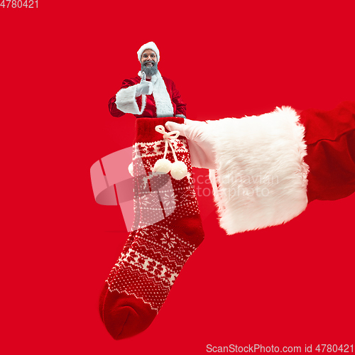 Image of Happy Christmas Santa Claus on studio background