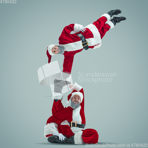 Image of Happy Christmas Santa Claus on studio background