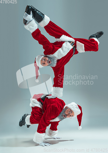 Image of Happy Christmas Santa Claus on studio background