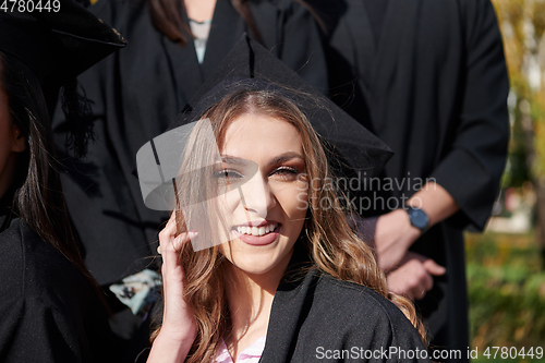 Image of Group of diverse international graduating students celebrating