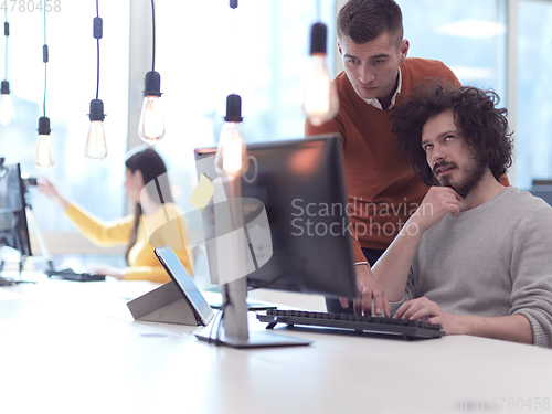Image of creative business people team as freelancers in modern coworking open space office