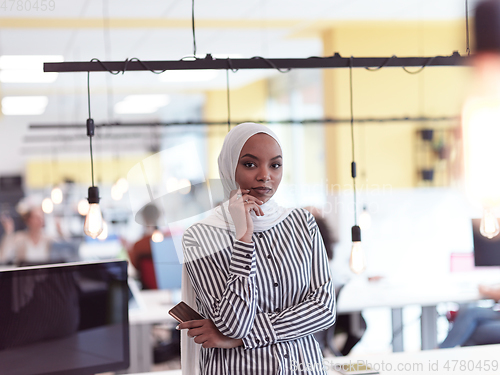 Image of African muslim businesswoman portrait at office