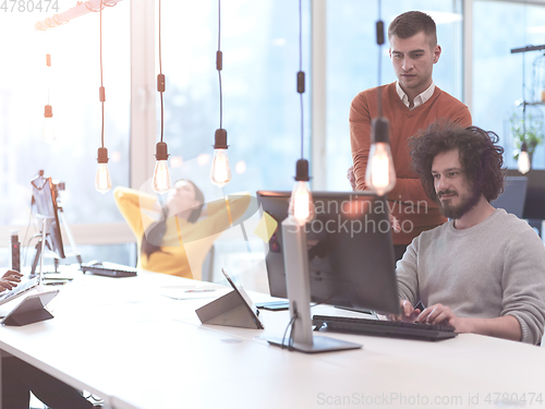 Image of creative business people team as freelancers in modern coworking open space office