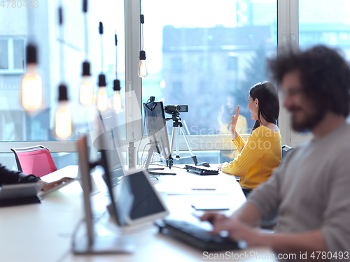 Image of business woman have online meeting in modern open space coworking office