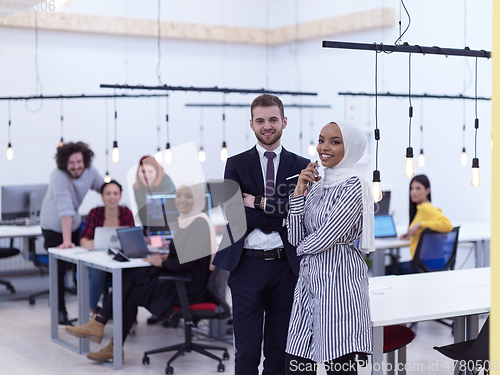 Image of Business team portrait at modern startup open space coworking office