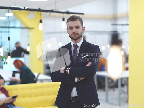 Image of businessman portrait in modern coworking open space office