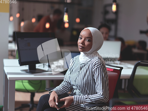 Image of African muslim businesswoman portrait at office