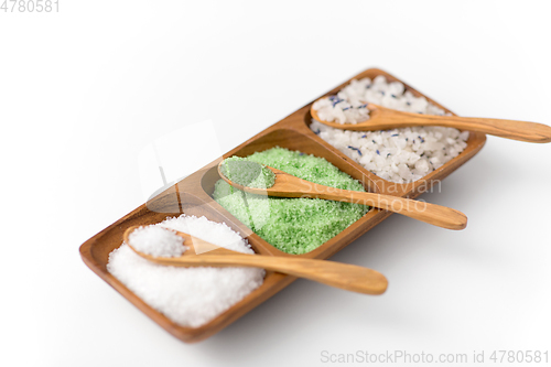 Image of sea salt and spoons on wooden tray