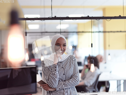 Image of African muslim businesswoman portrait at office