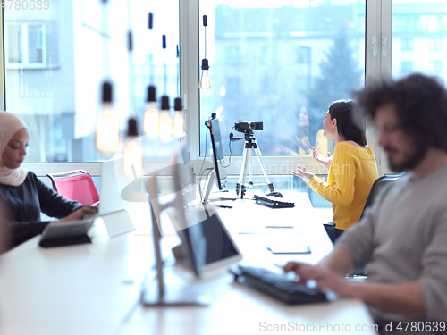 Image of business woman have online meeting in modern open space coworking office