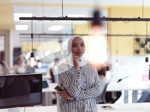 Image of African muslim businesswoman portrait at office