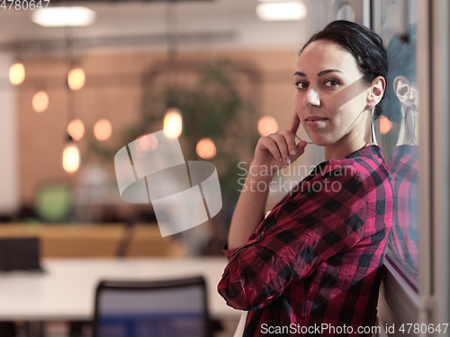 Image of business woman portrait in open space office