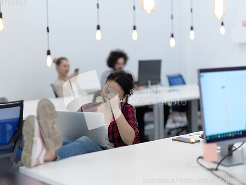 Image of business woman portrait in open space startup coworking office