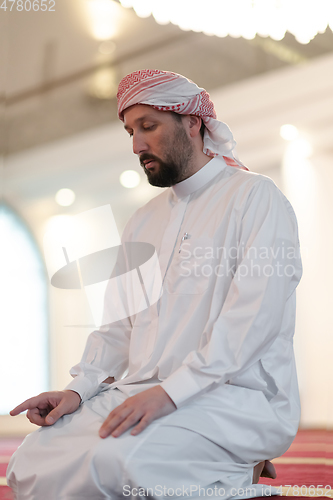 Image of muslim prayer inside the mosque