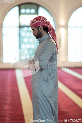 Image of muslim prayer inside the mosque