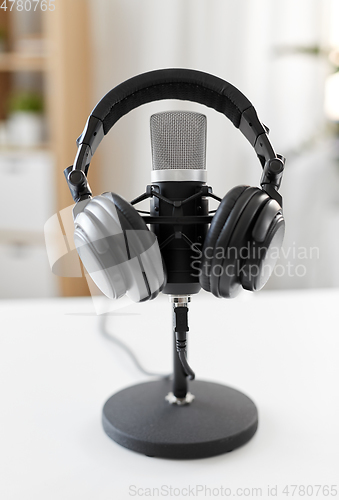 Image of headphones and microphone at home office