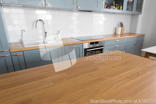 Image of home kitchen interior with counter and table