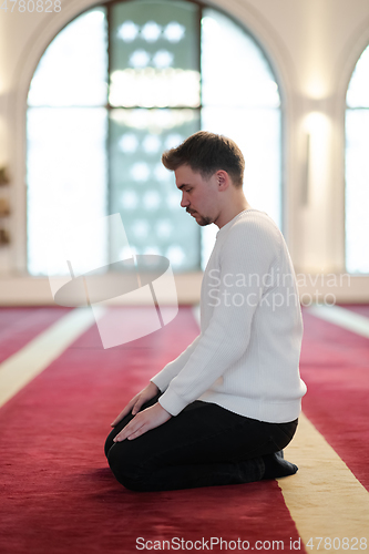 Image of muslim prayer inside the mosque