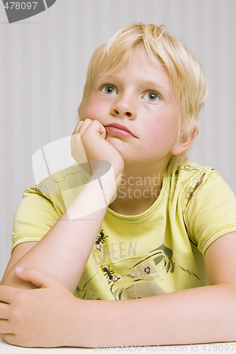 Image of young boy thinking