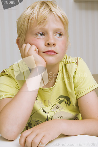 Image of young boy thinking