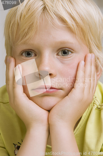 Image of young boy thinking