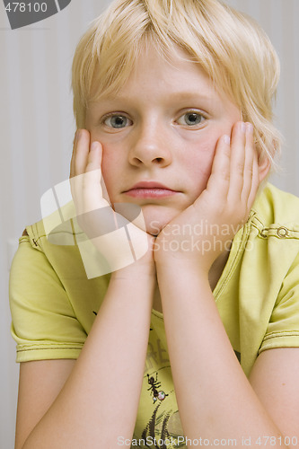 Image of young boy thinking