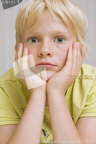 Image of young boy thinking