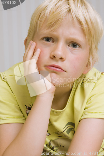 Image of young boy thinking