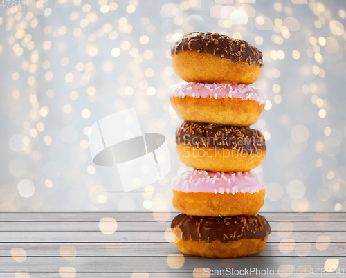 Image of close up of glazed donuts with sprinkles